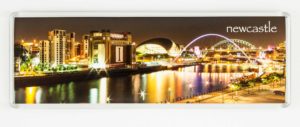 Tyne Vista Panoramic Fridge Magnet - newcastlegifts Tyne Vista Panoramic Fridge Magnet, Nighttime Panoramic photograph of the Newcastle Gateshead Quayside, Gateshead Millennium Bridge, Tyne Bridge, Sage Gateshead, Baltic Arts Centre, Olympic Rings on Tyne Bridge