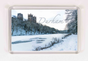 Snowy Durham landscape with cathedral towers, bare trees, and 'Durham' in elegant script across the scene.
