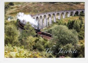 Steam locomotive steaming through a long stone-arch viaduct across a green valley; caption reads “The Jacobite.”Greeting Card The Jacobite, British Railways, LNER, ScotRail, The Jacobite Steam Train service, Glenfinnan Viaduct, Harry Potter, Hogwarts Express steam train, Fort William, Mallaig, Scottish Highlands, Loch Shiel, Steam trains, Golden Age of Steam